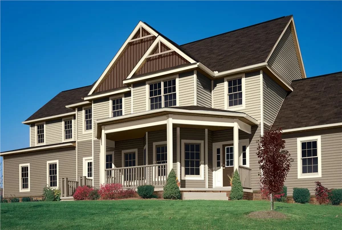Brown and tan house with casement windows