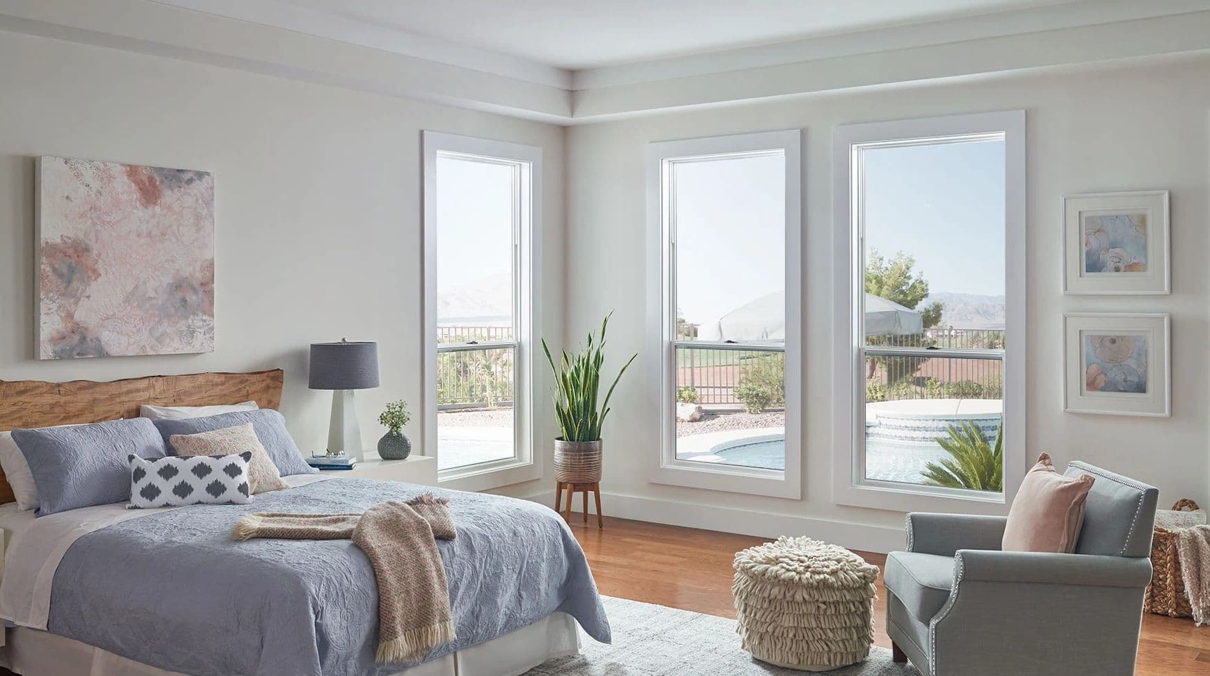 Bedroom with three elongated casement windows
